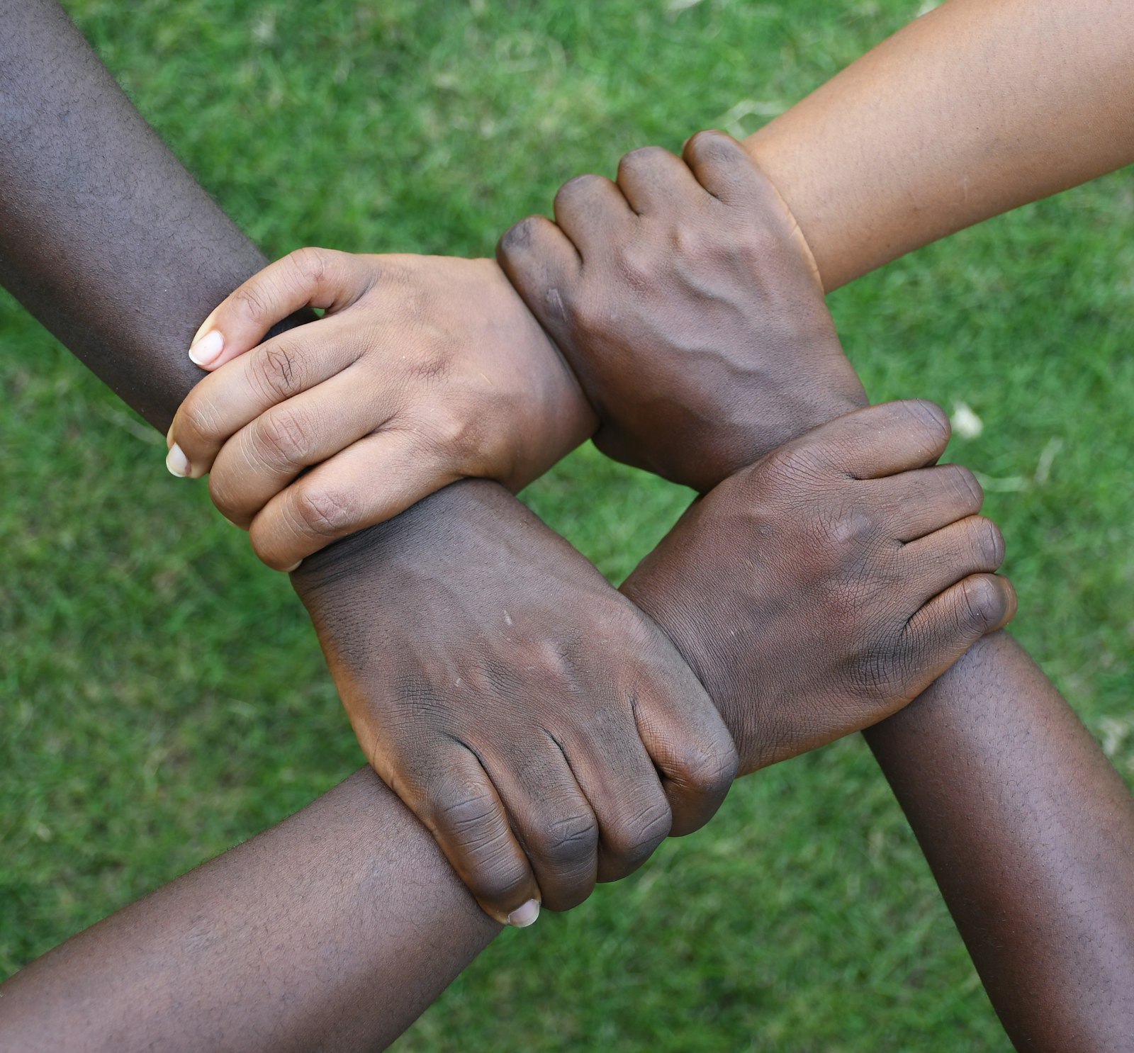 Hands joined together in support
